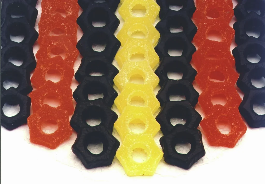 Ananas- und Orangengelee- Sterne, gezuckert/schokoliert 1000g