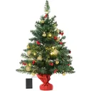 Christbaum mit Stechpalmenbeeren